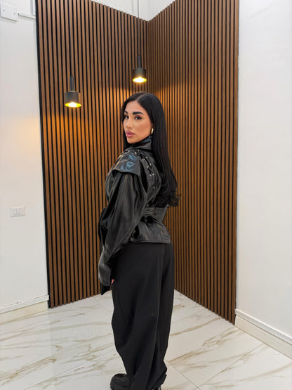 GIACCA IN VINILE CON STRINGHE