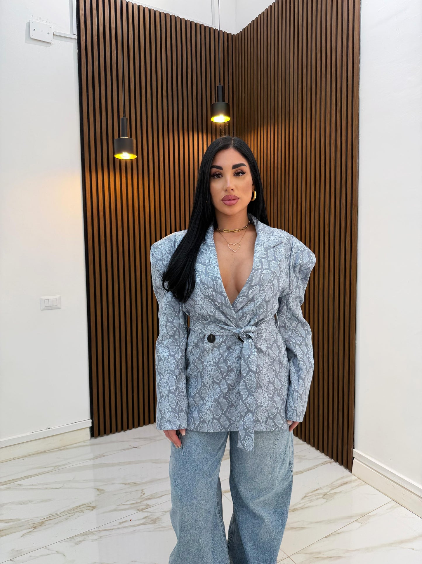 GIACCA PITONATA IN ECOPELLE CELESTE